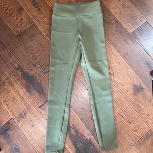 Green leggings